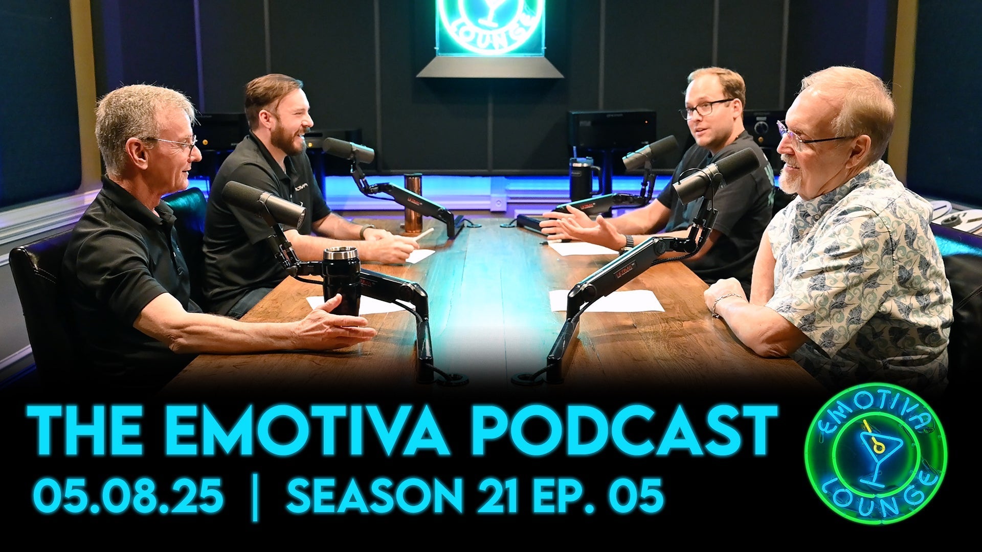 Photo of 4 people at a table recording podcast