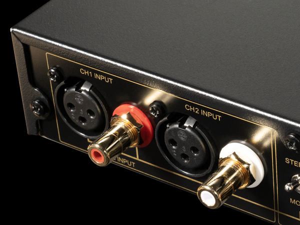 Audio interface with input jacks on a black background