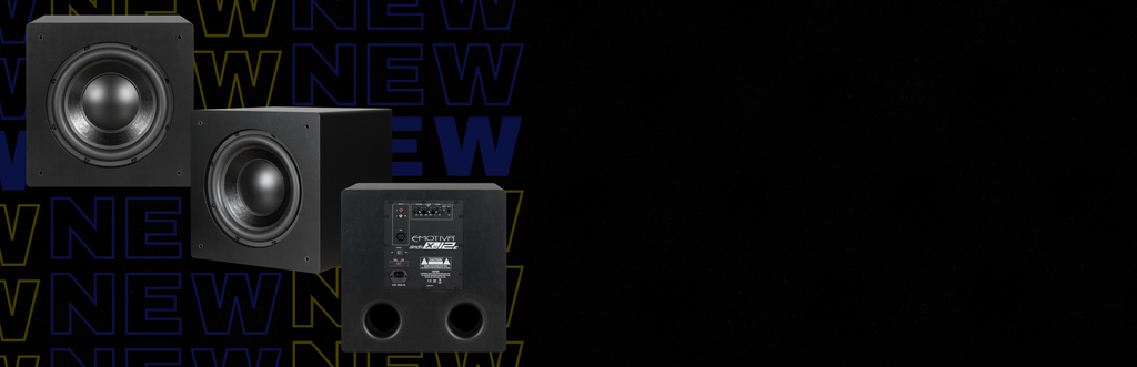Three XS12e subwoofers with the word NEW on a black background