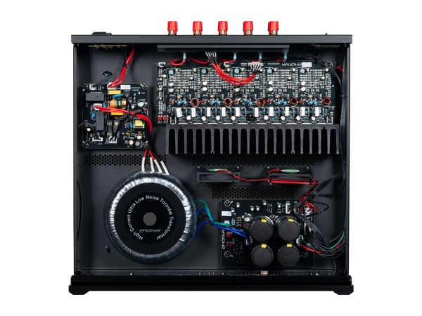 top down view of an audio amplifier with visible wiring and components on a white background