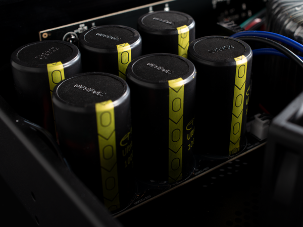 Close-up of electronic components with capacitors and printed circuit board