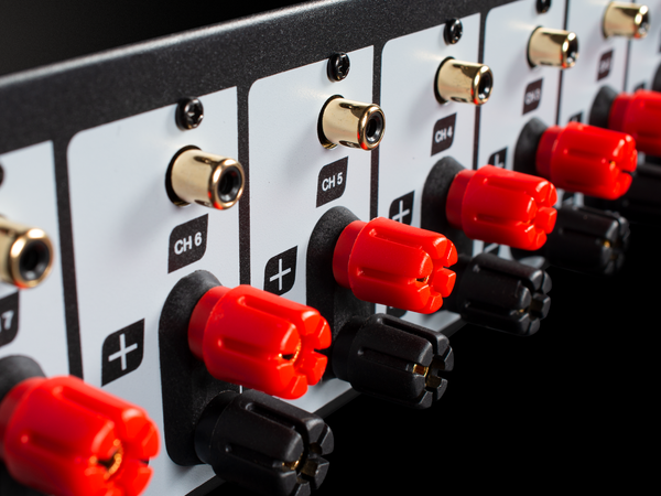 closeup of back panel of BasX A7 amplifier, showing the different channels