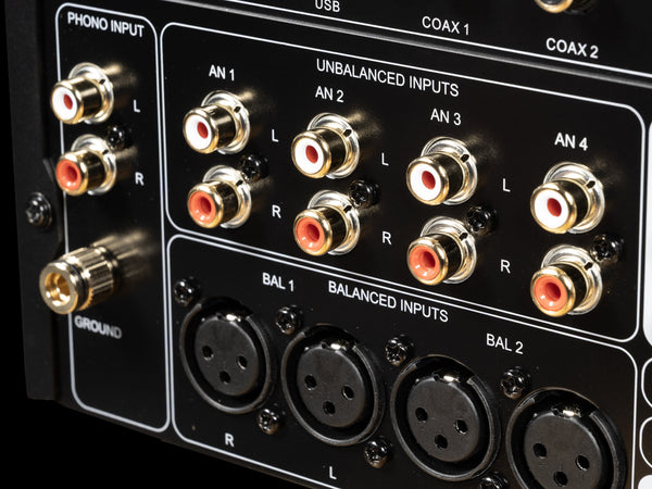 Audio equipment with RCA and XLR input connectors on a black background