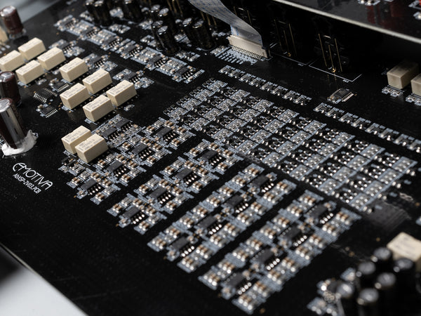 Close-up of a circuit board with Exotvia branding