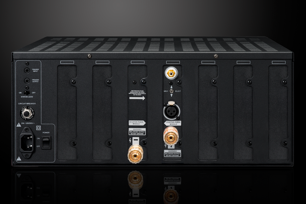 Photo of the rear view of the XPA Gen3 DR1 1 Channel Amplifier on a dramatic gray background showing off the inputs and outputs
