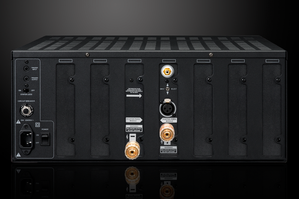 Photo of the rear view of the XPA Gen3 DR1 1 Channel Amplifier on a dramatic gray background showing off the inputs and outputs