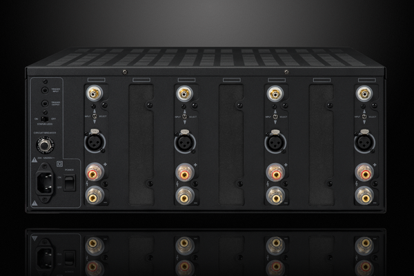 Photo of the back of a black Emotiva XPA-4 Gen3 4 Channel showing various inputs and connectors