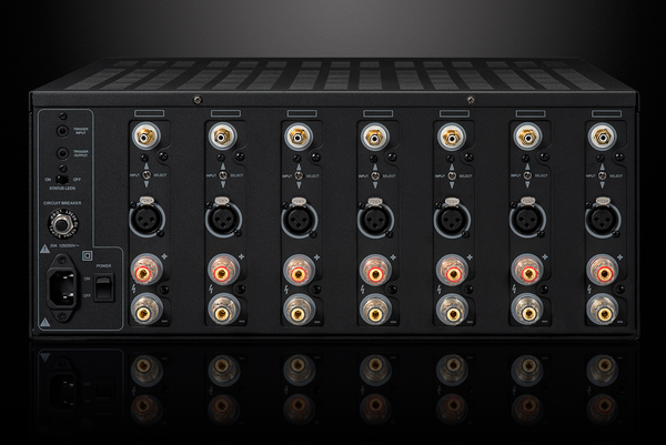 Photo of the rear view of the XPA Gen3 7 Channel Amplifier on a dramatic gray background showing off the inputs and outputs